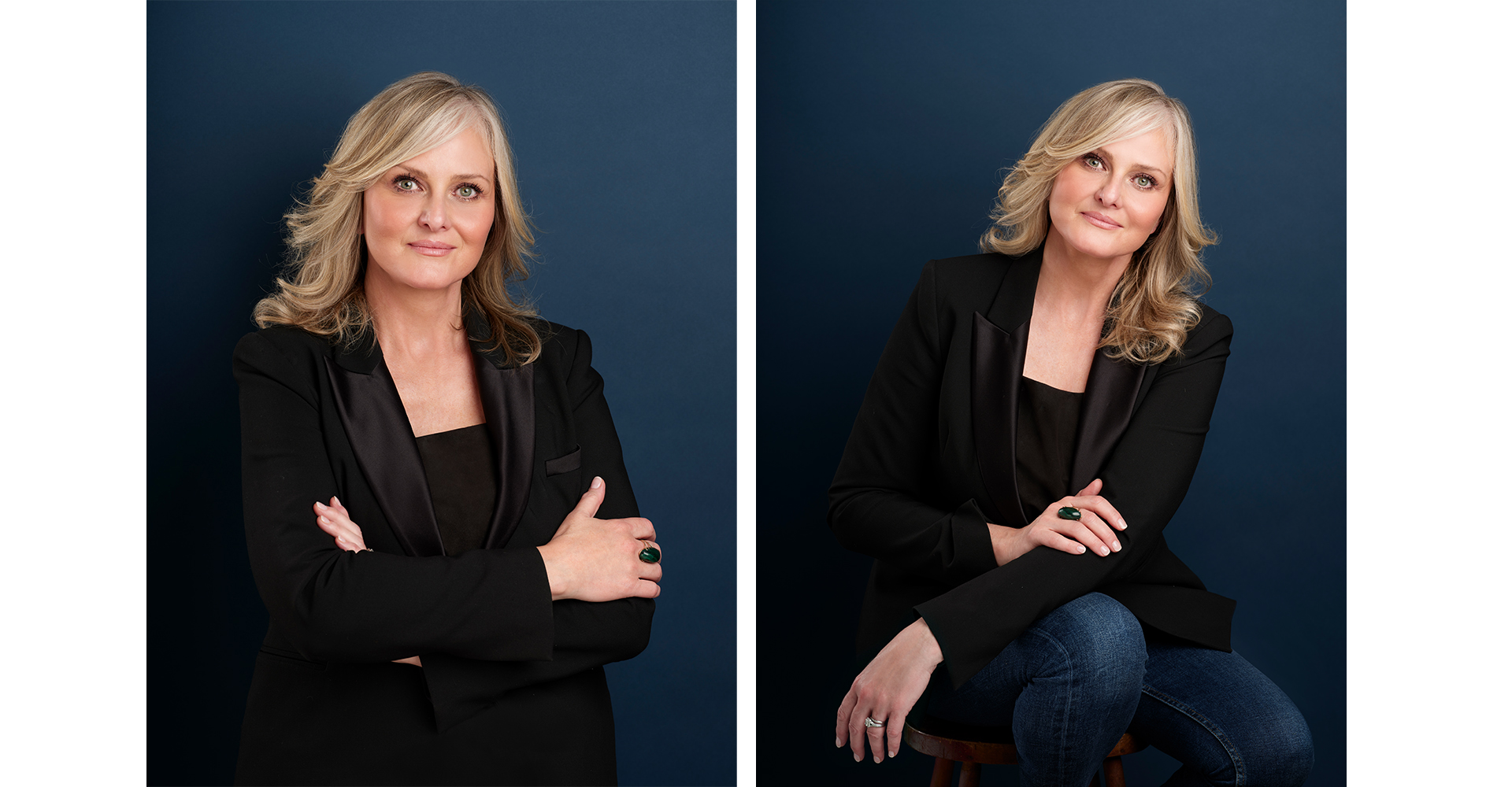 Female business woman posing for corporate head shot in front of Oxford blue backdrop